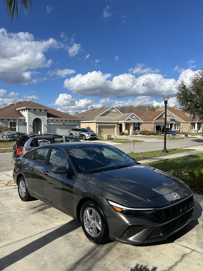 Grey Hyundai Elantra on a driveway after a full detail