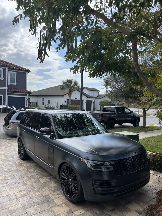 Range Rover in satin black, a finish that shows every mark and is showing none