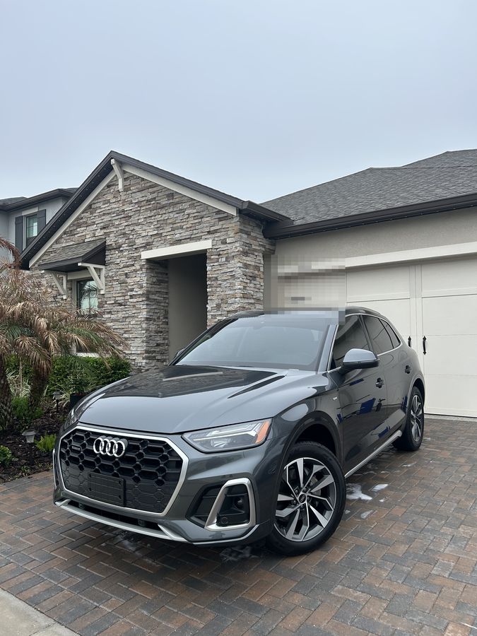 Grey Audi Q5 finished on a paver drive