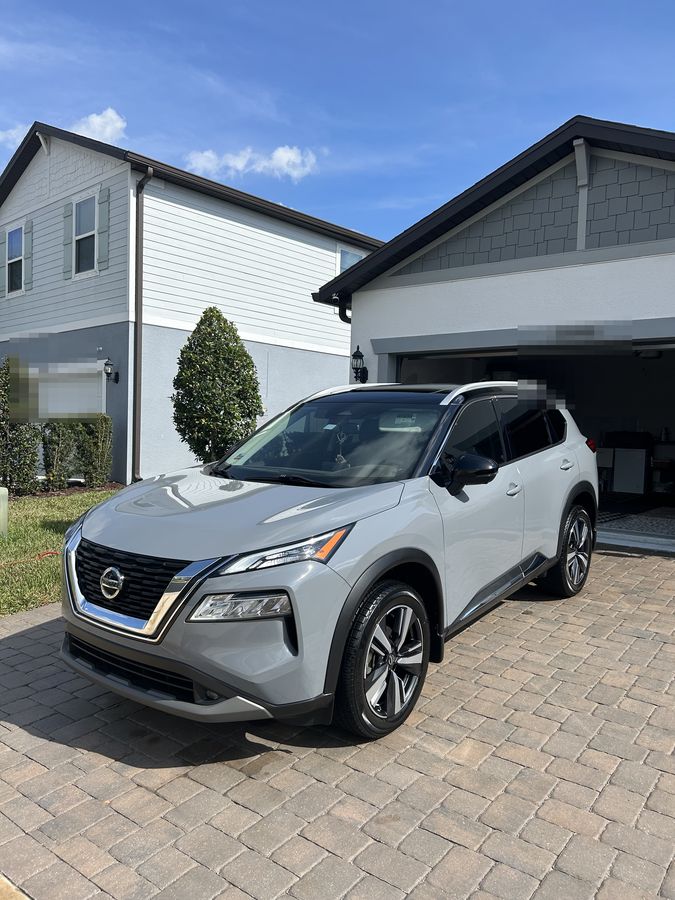 Silver Nissan Rogue on block paving, finished