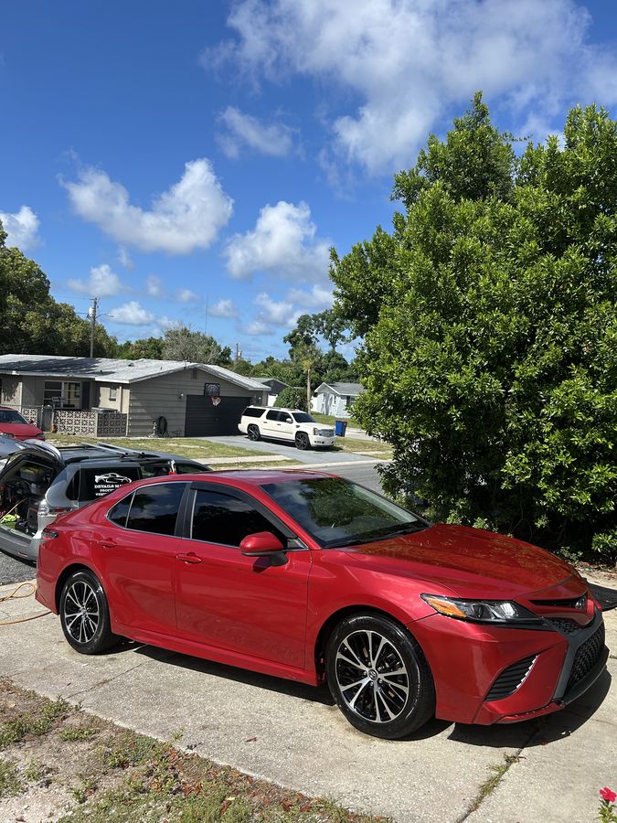 Red Toyota Camry, finished, kerbside